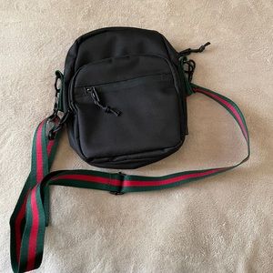 NWOT Small crossbody bag! Black with red & green straps.